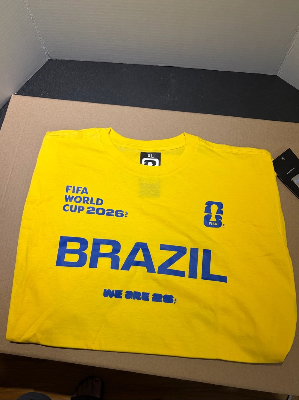 FIFA World Cup 2026
Brasil T-Shirt Size XL yellow/ blue We Are 2026 on the back